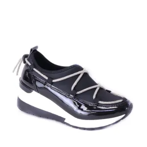 Black patient tennis shoes